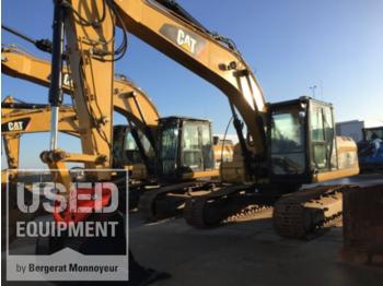 Kāpurķēžu ekskavators CATERPILLAR 323DL