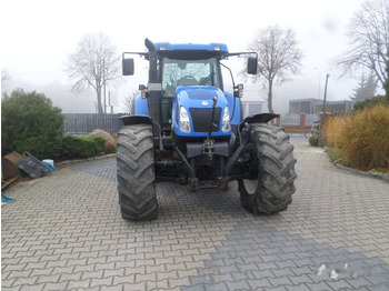 New Holland T7550 - Traktors: foto 1