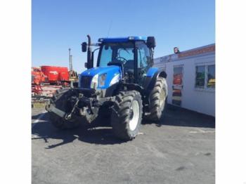 Traktors New Holland TS 100A: foto 1