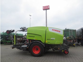 Rituļu prese CLAAS Rollant 455 RC Uniwrap mit Ballenaufsteller