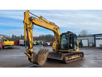 Kāpurķēžu ekskavators NEW HOLLAND
