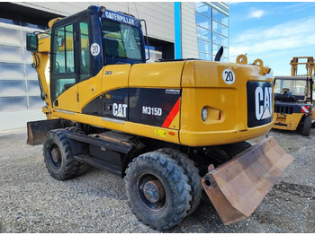 Riteņu ekskavators CATERPILLAR M315D