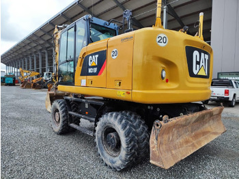 Riteņu ekskavators CATERPILLAR M318F