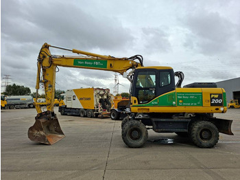 Riteņu ekskavators KOMATSU