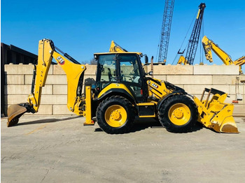 Ekskavators-iekrāvējs CAT 444 4x4: foto 2