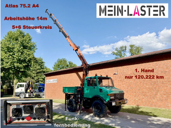 Kravas auto ar manipulatoru UNIMOG U1200