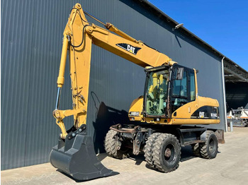 Riteņu ekskavators CATERPILLAR M316C