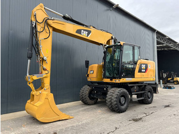 Riteņu ekskavators CATERPILLAR M318F