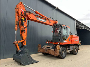 Riteņu ekskavators DOOSAN DX210