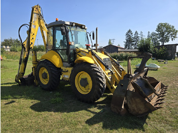 Ekskavators-iekrāvējs NEW HOLLAND