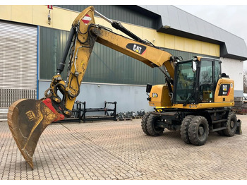 Riteņu ekskavators CATERPILLAR