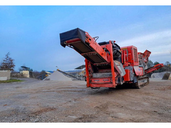 Trieciena drupinātājs TEREX