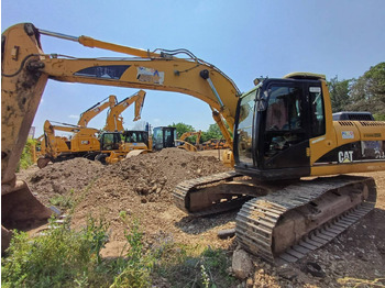 Kāpurķēžu ekskavators CATERPILLAR 318