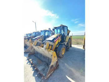 Ekskavators-iekrāvējs CATERPILLAR 428