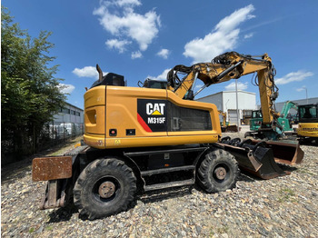 Riteņu ekskavators CAT M315F: foto 3