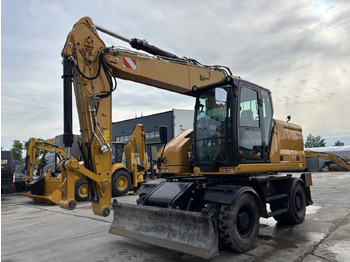 Riteņu ekskavators CATERPILLAR M318