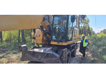 Riteņu ekskavators CATERPILLAR M318F