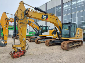 Kāpurķēžu ekskavators CATERPILLAR 323