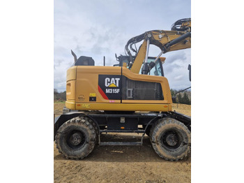 Riteņu ekskavators Caterpillar M315F F: foto 3