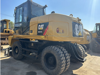Riteņu ekskavators CATERPILLAR M318