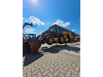 Ekskavators-iekrāvējs CAT 428D: foto 3