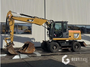 Riteņu ekskavators CATERPILLAR M313D