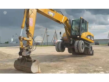 Riteņu ekskavators CAT M315C: foto 2