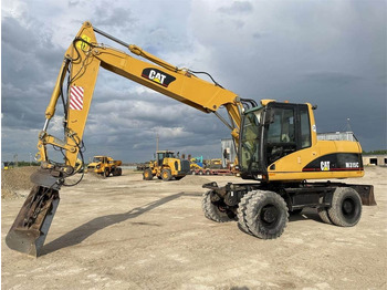 Riteņu ekskavators CAT M315C: foto 3