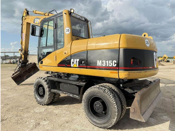 Riteņu ekskavators CATERPILLAR M315C