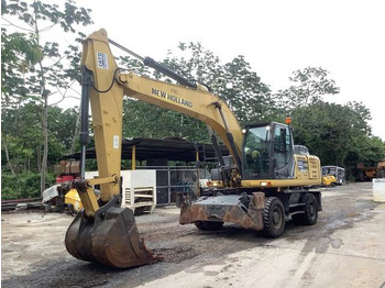 Riteņu ekskavators NEW HOLLAND