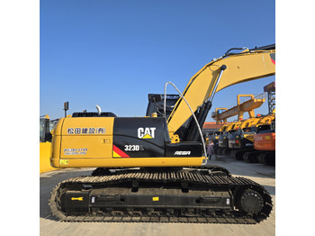 Ekskavators CATERPILLAR 323DL