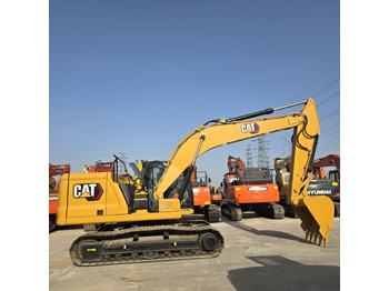Kāpurķēžu ekskavators CATERPILLAR 323