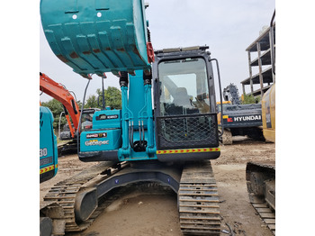Kāpurķēžu ekskavators KOBELCO SK140: foto 4