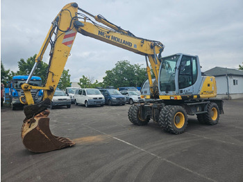 Riteņu ekskavators NEW HOLLAND