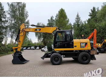 Riteņu ekskavators CATERPILLAR M313D