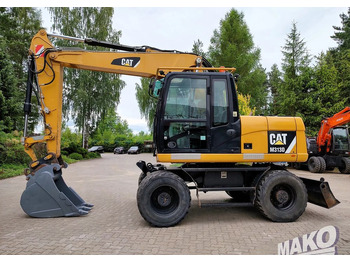 Riteņu ekskavators CATERPILLAR M313D