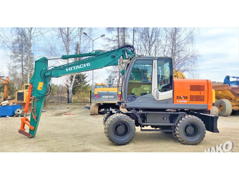 Riteņu ekskavators HITACHI ZX140W-3