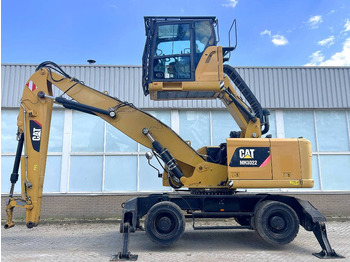 Atkritumu iekrāvējs CATERPILLAR MH3022