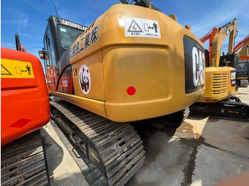 Kāpurķēžu ekskavators CATERPILLAR 323D