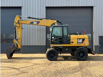 Riteņu ekskavators CATERPILLAR M313D