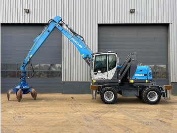 Atkritumu iekrāvējs Fuchs MHL 250: foto 4 Atkritumu iekrāvējs Fuchs MHL 250: foto 4