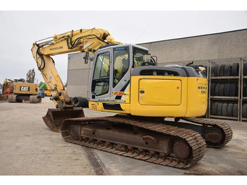 Kāpurķēžu ekskavators NEW HOLLAND