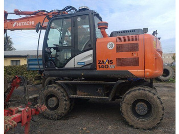 Riteņu ekskavators HITACHI ZX140W-5