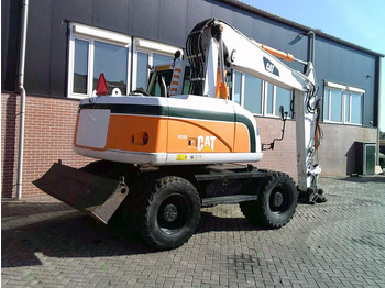 Riteņu ekskavators Caterpillar M313D: foto 4