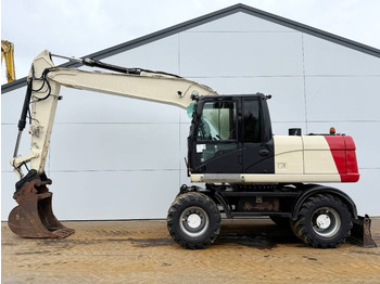 Riteņu ekskavators CATERPILLAR M316D