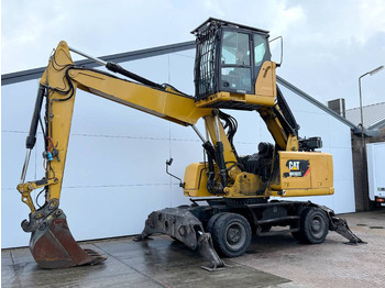 Atkritumu iekrāvējs CATERPILLAR MH3022