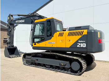 Jaunā Kāpurķēžu ekskavators Hyundai R210 *2025 Model* - New / Unused / Hammer Lines: foto 3