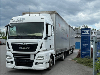 Kravas automašīna ar tentu MAN TGX