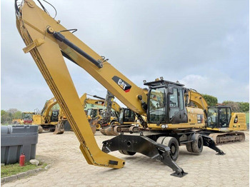 Atkritumu iekrāvējs CATERPILLAR M322D MH