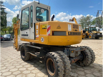 Riteņu ekskavators LIEBHERR